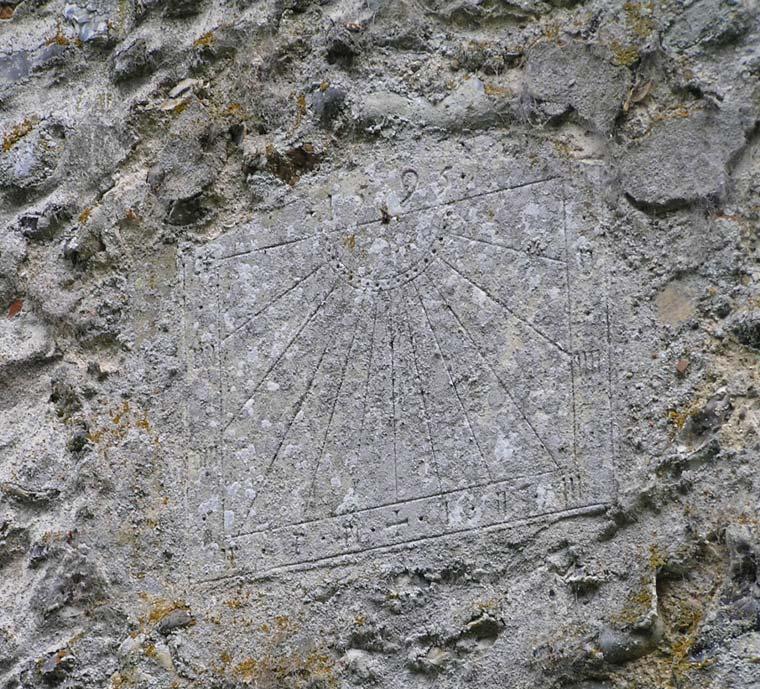 incised sundial with the date 1595