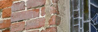 The brick work of the raised reveal was rendered over, as revealed by the few traces remaining; and