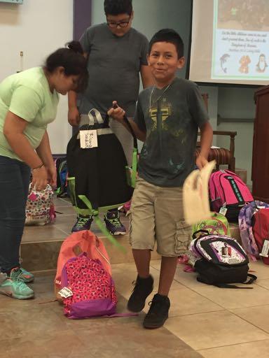 mission be living words in the world around us. Sunday, members of our community gathered in worship for the Blessing of the Backpacks.